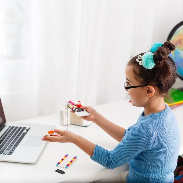 elementary school child attending virtual classes