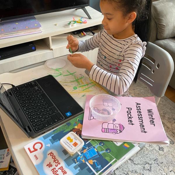 Virtual Kindergartener at home desk