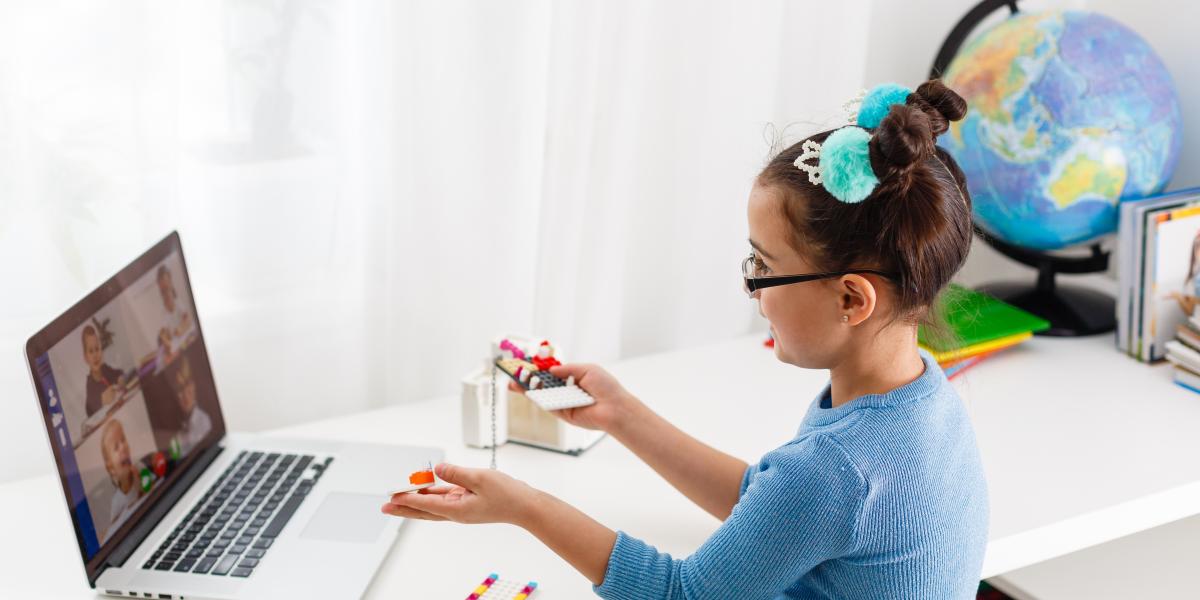 elementary school child attending virtual classes